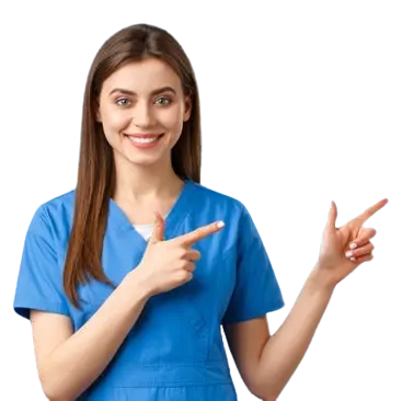 A smiling female healthcare professional in blue scrubs is pointing with both hands to the right side of the image. She has long brown hair and is looking directly at the camera, exuding a friendly and welcoming demeanor.